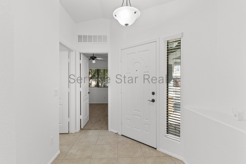 GORGEOUS POWER RANCH 4 BEDROOM WITH GRASS NEXT TO COMMUNITY PARK property image