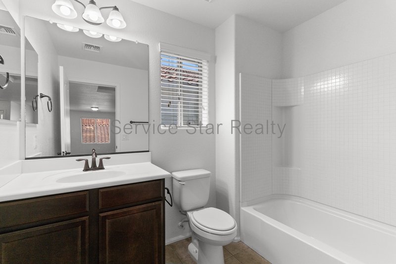 GORGEOUS POWER RANCH 4 BEDROOM WITH GRASS NEXT TO COMMUNITY PARK property image