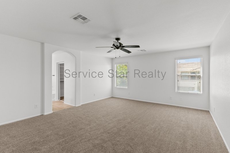 GORGEOUS POWER RANCH 4 BEDROOM WITH GRASS NEXT TO COMMUNITY PARK property image