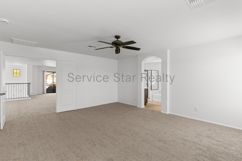 GORGEOUS POWER RANCH 4 BEDROOM WITH GRASS NEXT TO COMMUNITY PARK property image