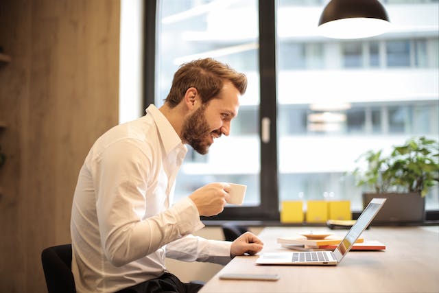 A person using a laptop.