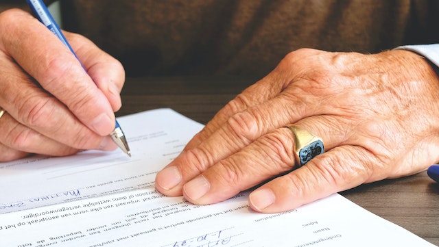 person signing a legal letter