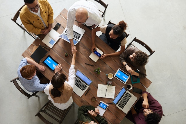 team of professionals at table