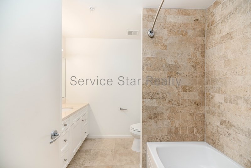 Bright, Modern 2-Bed, Optima Condo Steps from Old Town property image