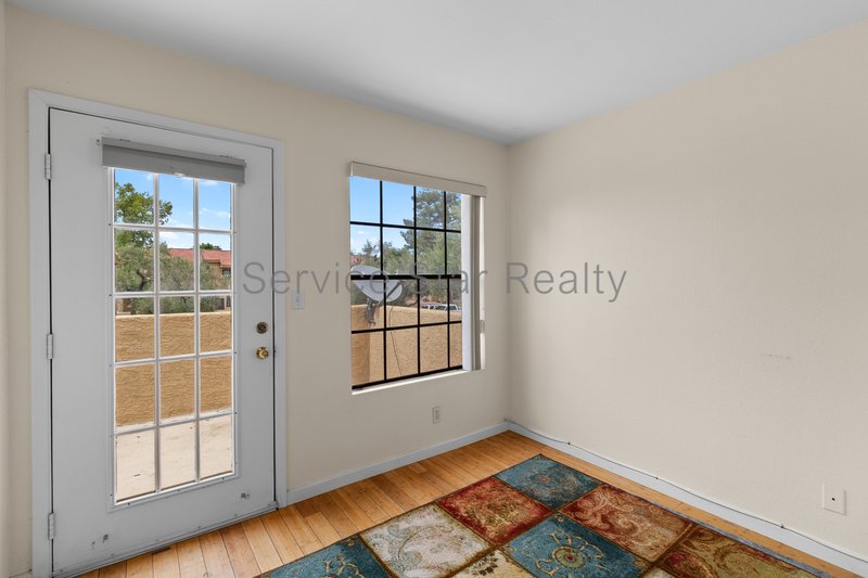 Clean & Move-In Ready | 2 Bed + Den Townhome Near Shopping & Dining property image