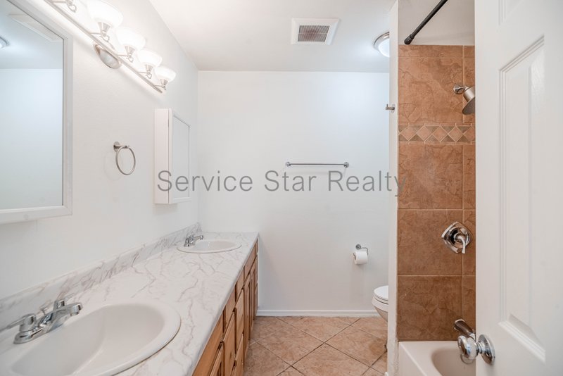 Beautifully updated 4 Bedroom - 2 primary suites with SOLAR!! property image